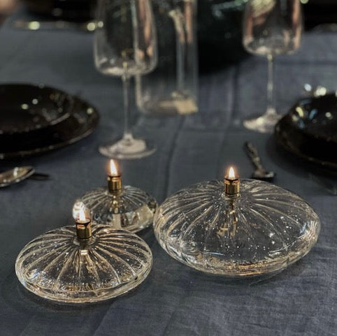 photo des trois tailles de la lampe à huile en forme de disque strié